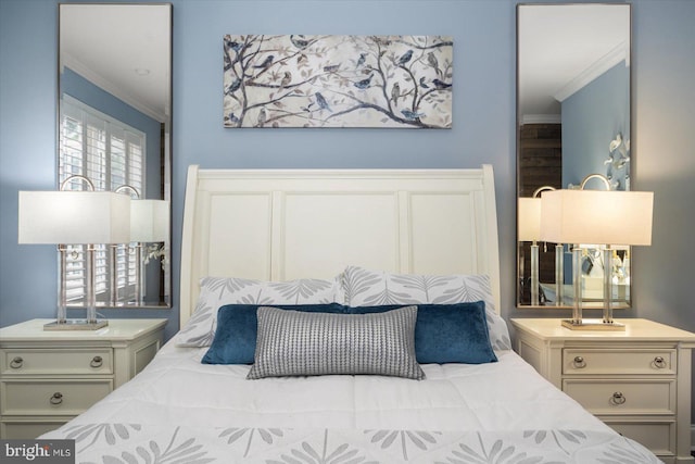 bedroom featuring ornamental molding