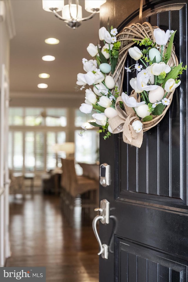 foyer with recessed lighting and a chandelier