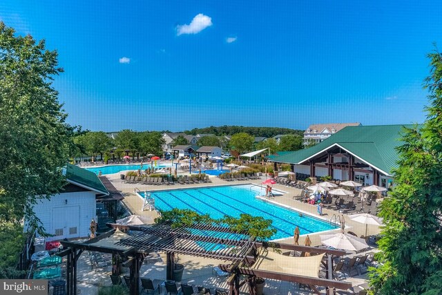 community pool featuring a patio