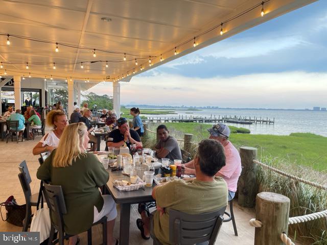 view of patio / terrace with a water view