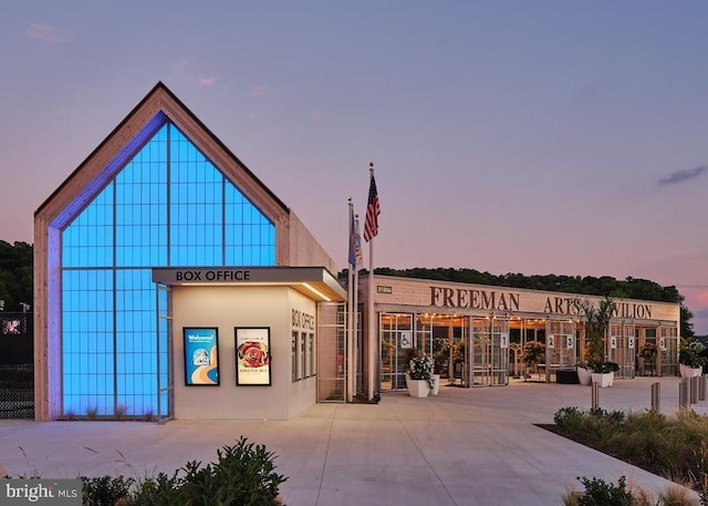 view of property at dusk