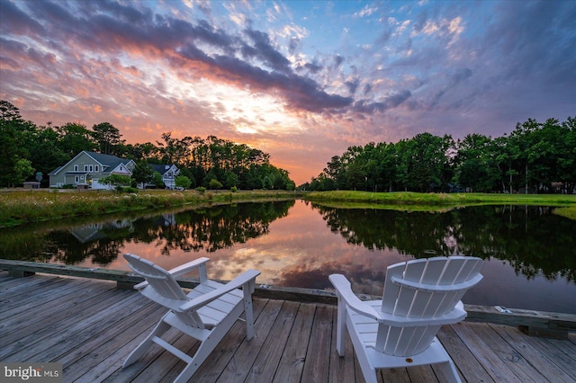 view of dock with a water view