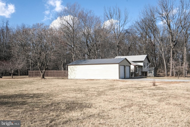 garage with fence