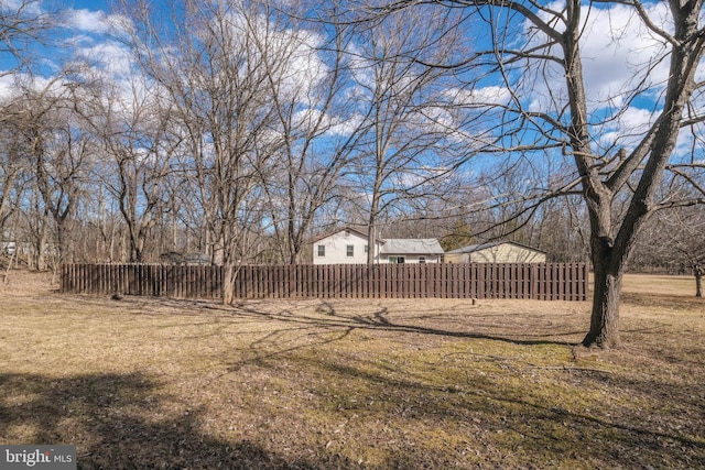 view of yard with fence