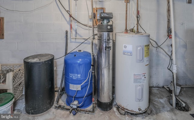 utility room with electric water heater