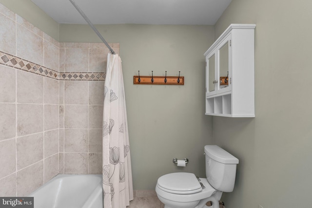 bathroom with toilet and shower / bathtub combination with curtain