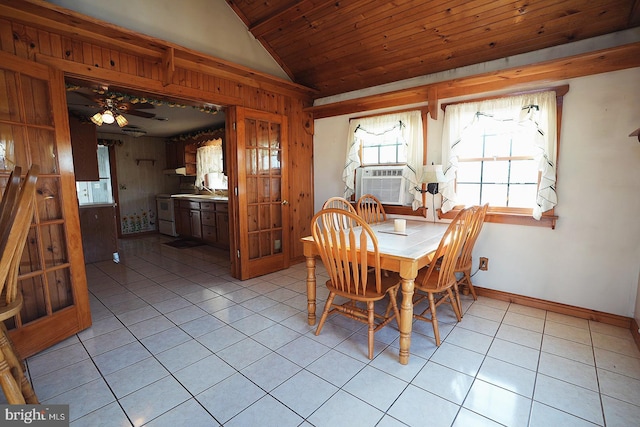 dining area featuring light tile patterned floors, wood ceiling, vaulted ceiling, cooling unit, and baseboards