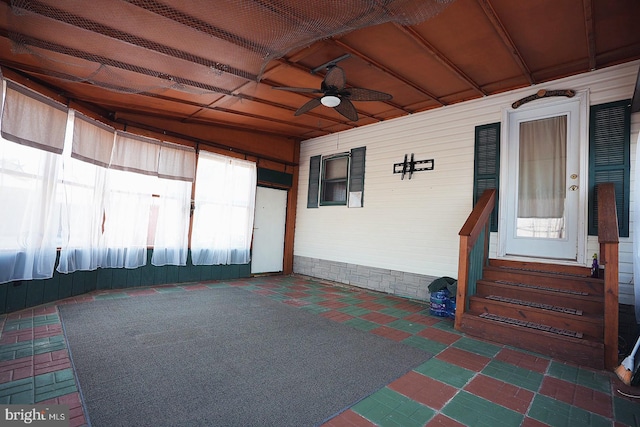 garage featuring a ceiling fan