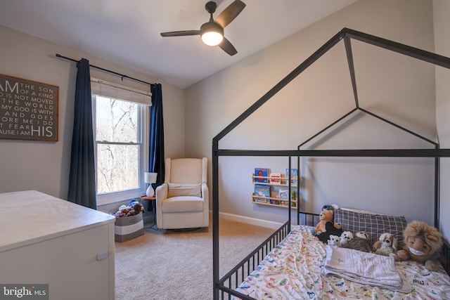 carpeted bedroom featuring a ceiling fan