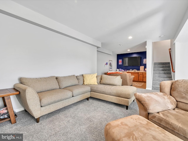 living area featuring carpet, stairs, and recessed lighting