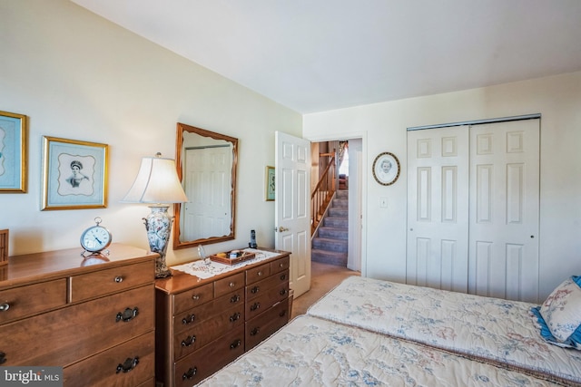 bedroom with a closet and carpet