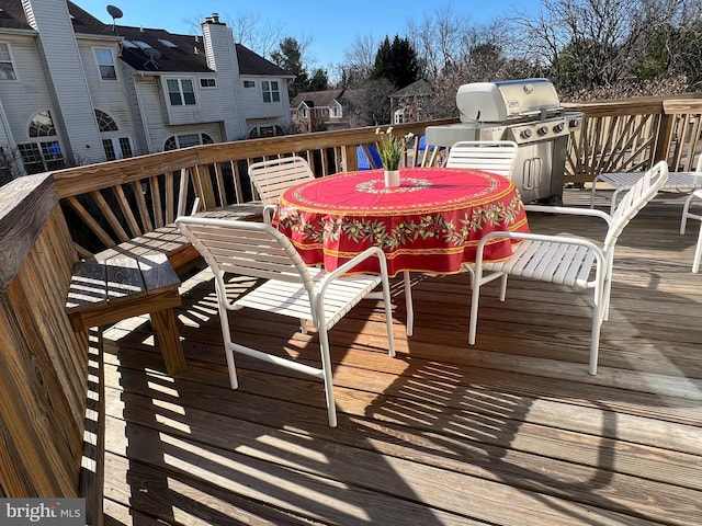 wooden deck featuring a residential view