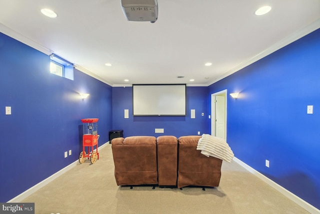 cinema featuring recessed lighting, baseboards, ornamental molding, and light colored carpet