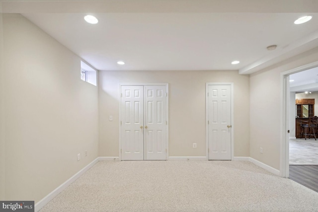 unfurnished bedroom with baseboards, carpet flooring, and recessed lighting