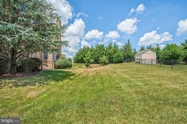 view of yard featuring fence