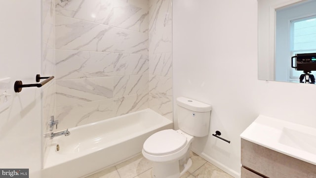 bathroom featuring toilet,  shower combination, vanity, and baseboards