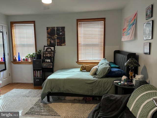 bedroom with light wood-style flooring