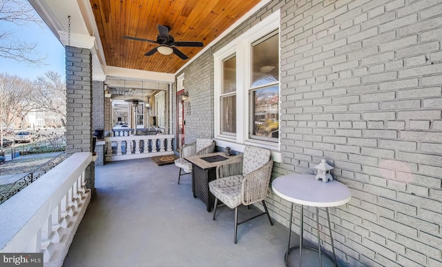 view of patio / terrace featuring ceiling fan