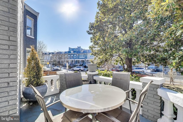 balcony with outdoor dining area