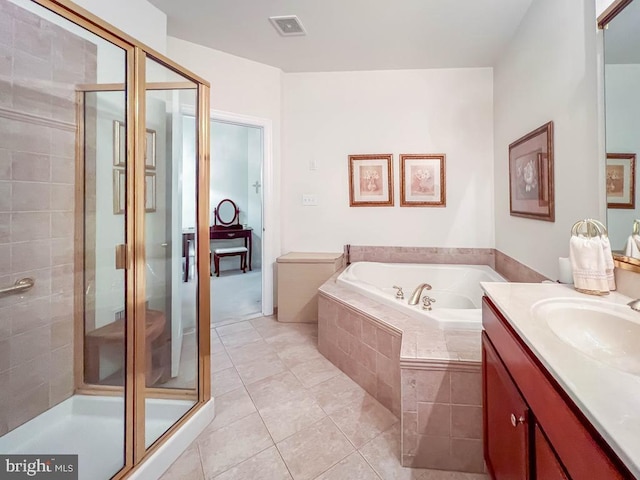 full bathroom with a stall shower, visible vents, a garden tub, and vanity