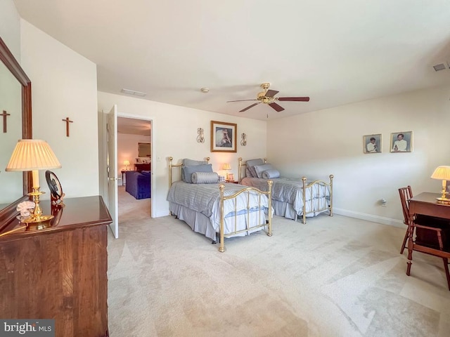 bedroom with light colored carpet, visible vents, ceiling fan, and baseboards