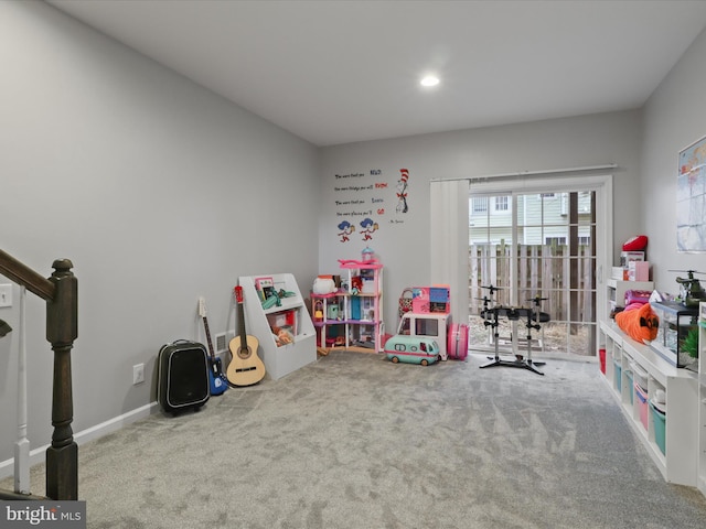 recreation room featuring baseboards, carpet, and recessed lighting