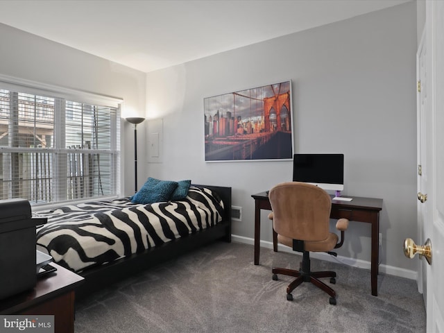 carpeted bedroom featuring visible vents and baseboards