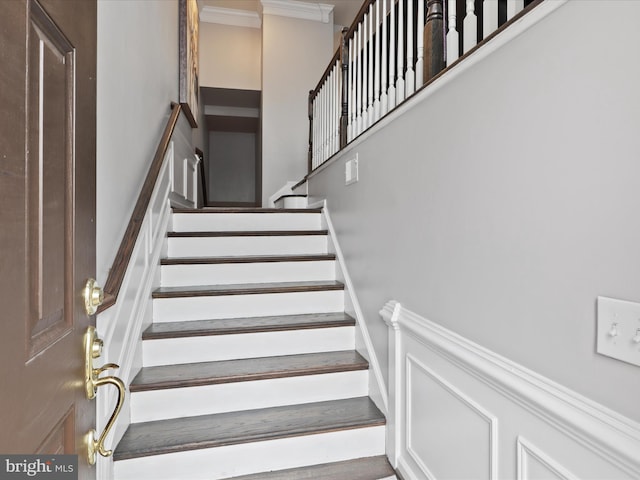 stairs with crown molding