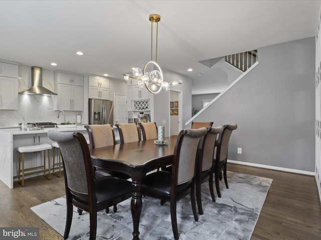 dining space with stairs, dark wood-type flooring, recessed lighting, and baseboards