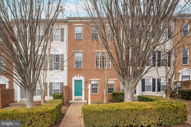 multi unit property featuring brick siding