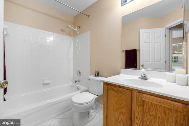 bathroom with vanity, bathing tub / shower combination, tile patterned flooring, and toilet