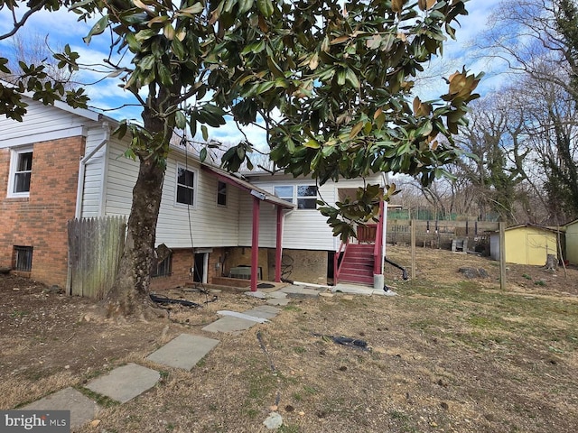 exterior space featuring brick siding