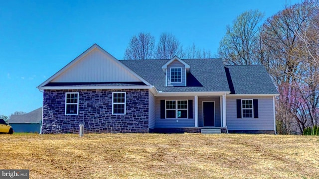 view of front of home with a front lawn