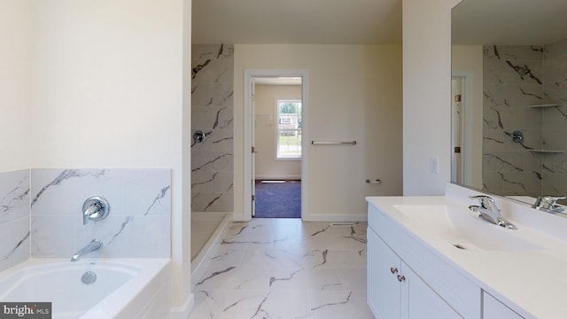 full bathroom featuring a shower, marble finish floor, a garden tub, vanity, and baseboards