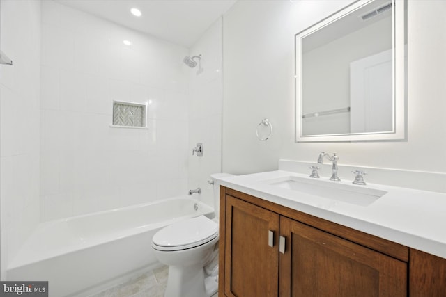 full bathroom featuring visible vents, shower / bathing tub combination, toilet, vanity, and tile patterned floors