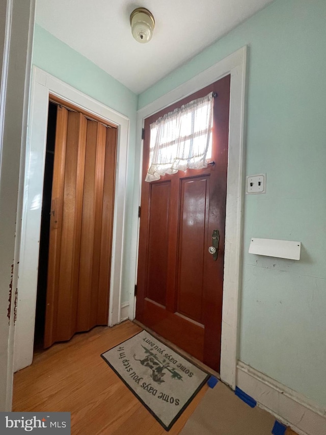 entrance foyer featuring light wood-style floors