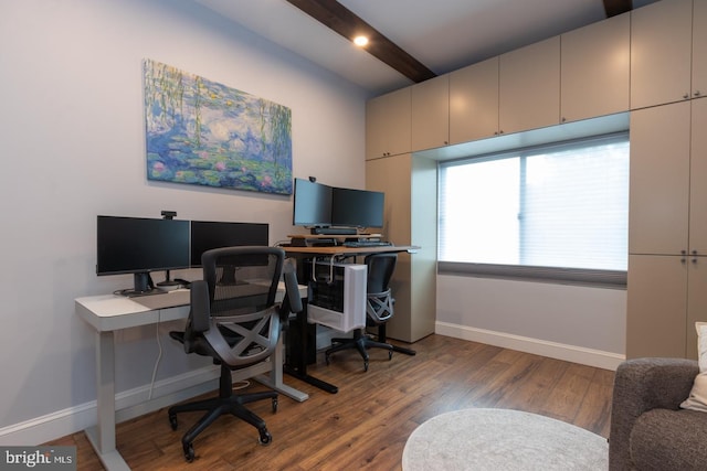 office space featuring baseboards, wood finished floors, and beamed ceiling