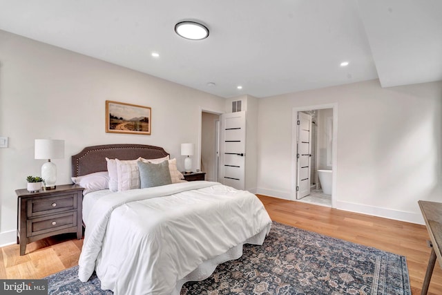 bedroom with recessed lighting, light wood-type flooring, visible vents, and baseboards