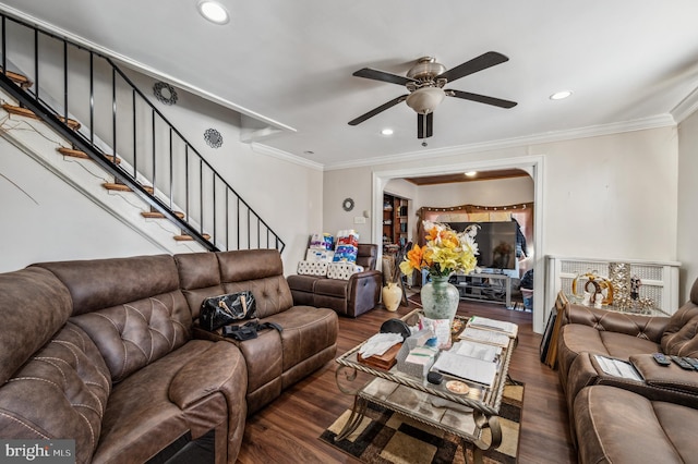 living area featuring dark wood-style floors, ornamental molding, stairway, and recessed lighting