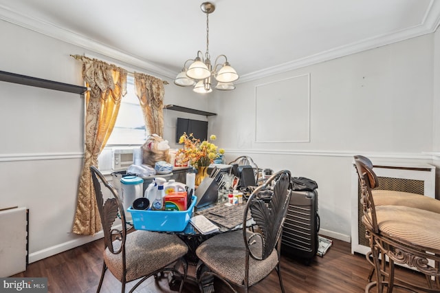 dining area with an inviting chandelier, dark wood finished floors, and crown molding