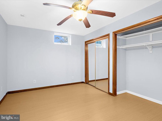 unfurnished bedroom featuring light wood finished floors and baseboards