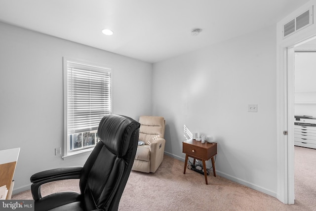 home office featuring carpet flooring, visible vents, and baseboards