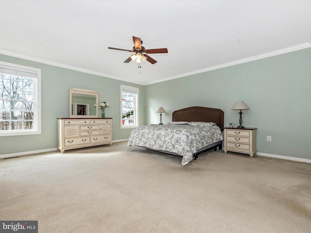 bedroom with baseboards, ornamental molding, and light colored carpet