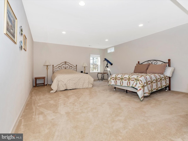 bedroom with recessed lighting, baseboards, and light colored carpet