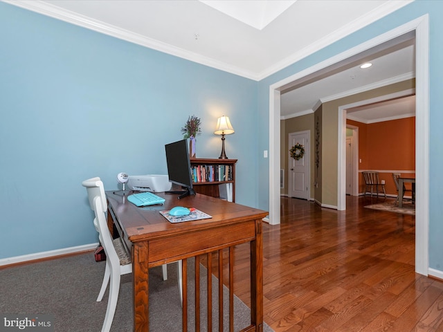 home office featuring a skylight, baseboards, dark wood finished floors, and crown molding