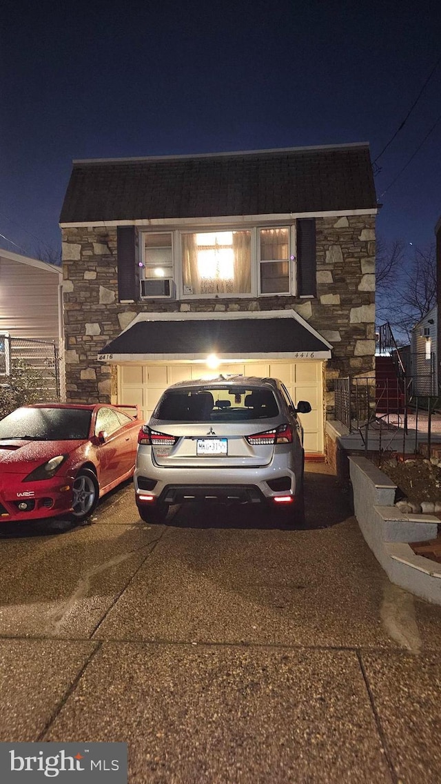 view of front of home featuring stone siding