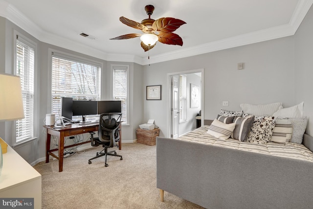 bedroom featuring light colored carpet, visible vents, ornamental molding, ceiling fan, and baseboards