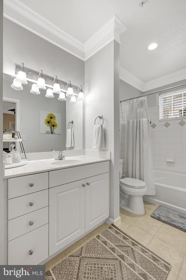 bathroom with toilet, tile patterned flooring, crown molding, and vanity