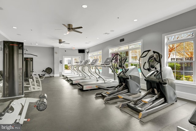 exercise room with recessed lighting and baseboards