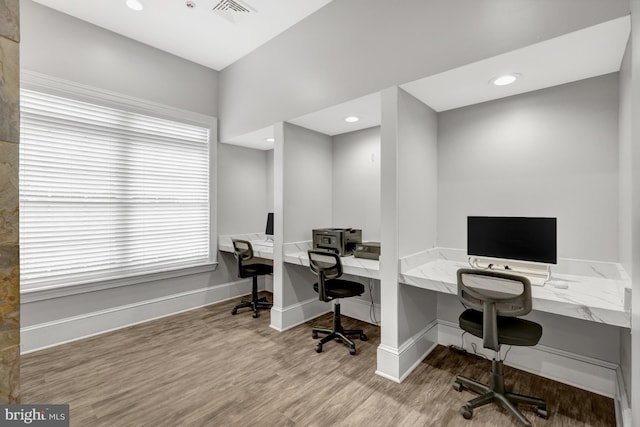 office area featuring recessed lighting, wood finished floors, visible vents, and baseboards